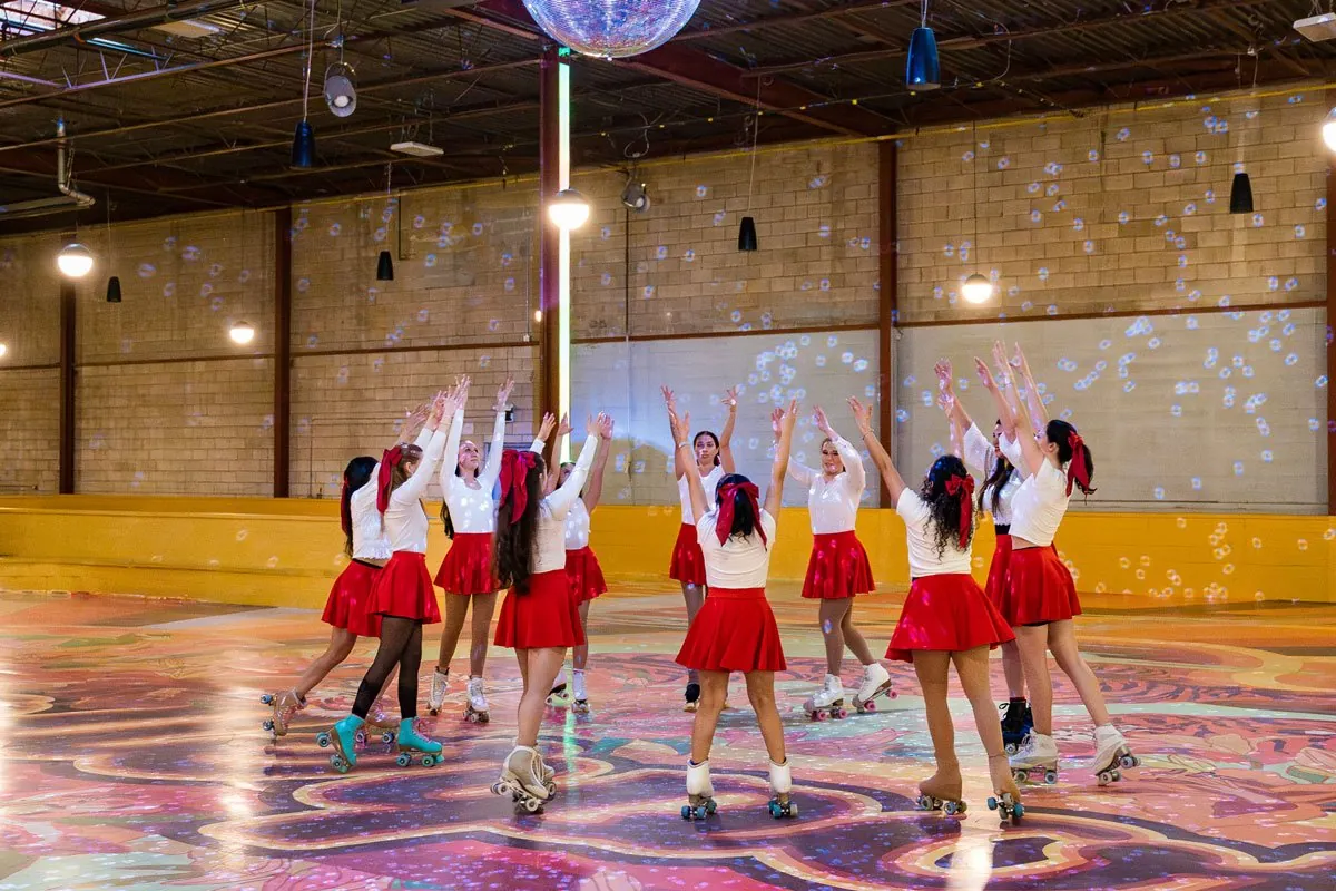 ARS skaters performing a group routine on the rink